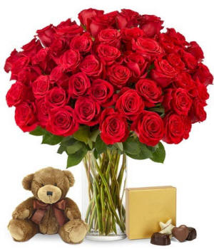 Fifty red roses with teddy bear and chocolates