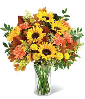 Autumn sunflower bouquet with seasonal fall foliage and warm accents