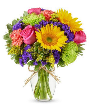 Bright sunflower bouquet with hot pink roses and vibrant mixed accents