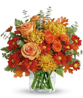 Fall Thanksgiving Bouquet with warm autumn flowers in orange, yellow, and burgundy tones