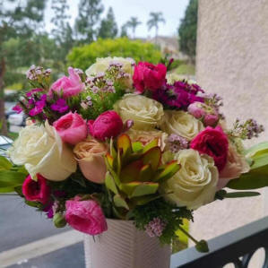 A colorful bouquet of purple and white flowers