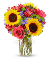 Sunflowers and roses in a clear vase - bright flowers delivered to Ahwatukee Phoenix AZ