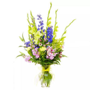 A vase filled with tall flowers