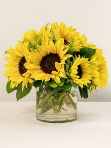 A Vase of Smiling Sunflowers